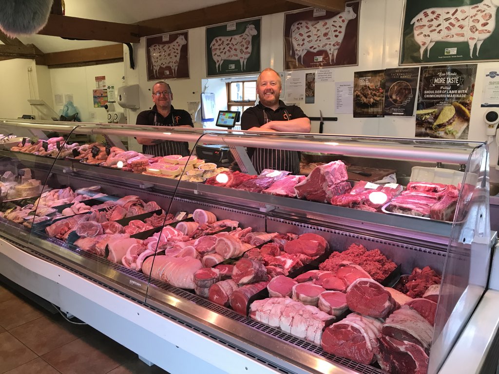 Churncote Farm Shop butcher counter with Mike and Steve